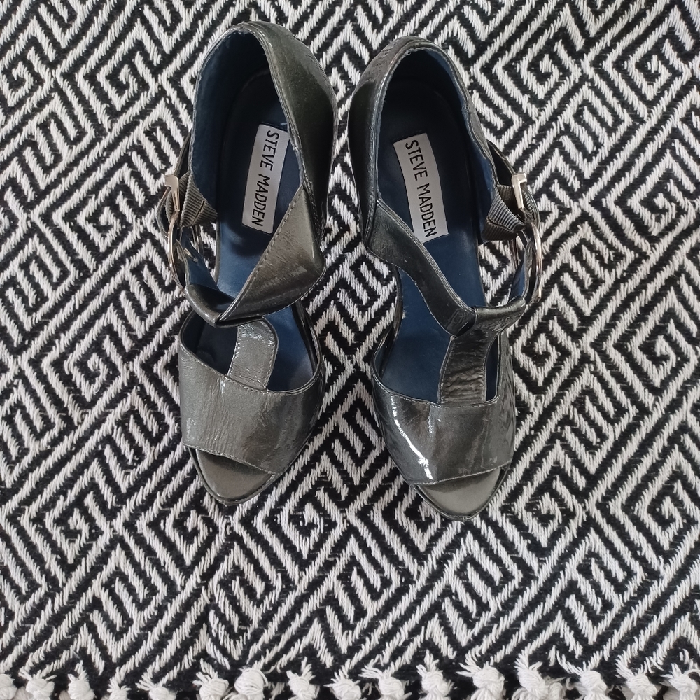 Grey patent leather 4 inch heels.  These heels are Steve Madden and very lighty